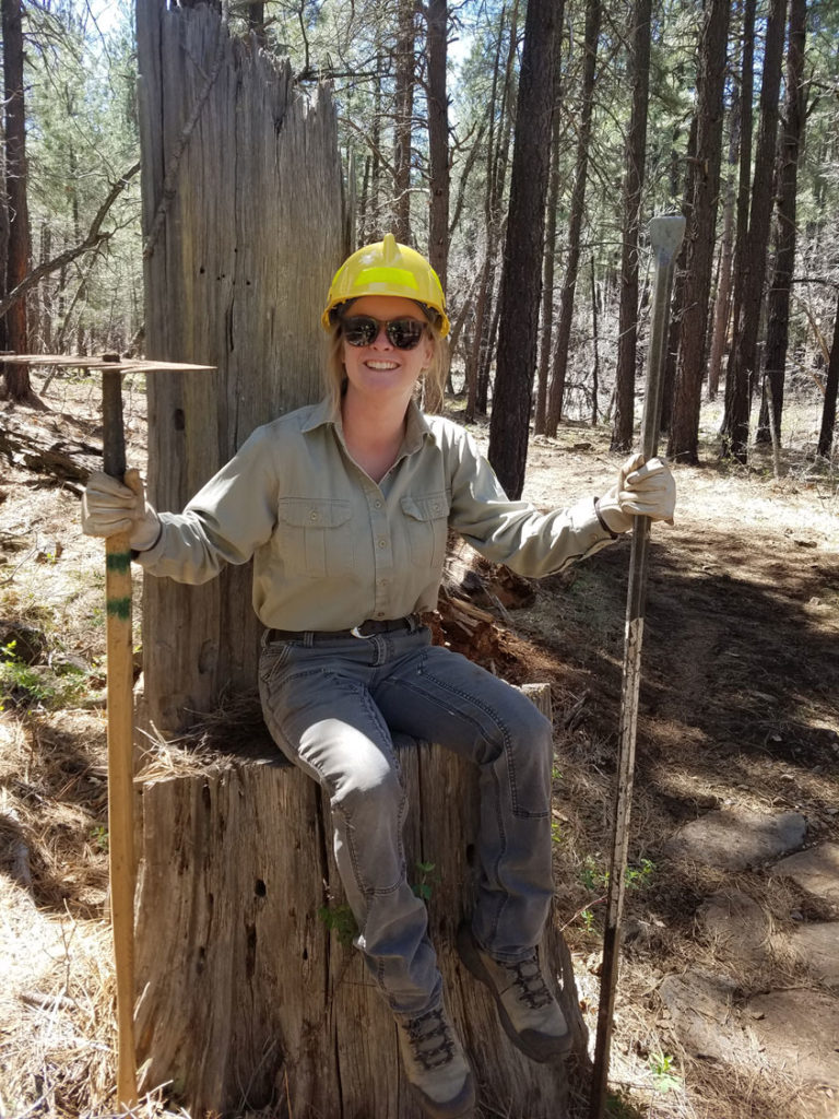 Forest Service Volunteer taking a break during construction