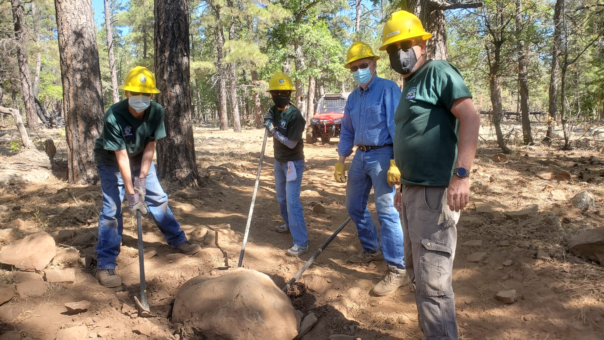 Boulder removal on the Frog Tank Connector Trial. (left to right) Ken Lasher, Mary Lasher, Tome Eade and Mike Striegler